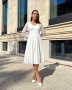 Rochie cununie civila design elegant cu perle și fermoar la spate.